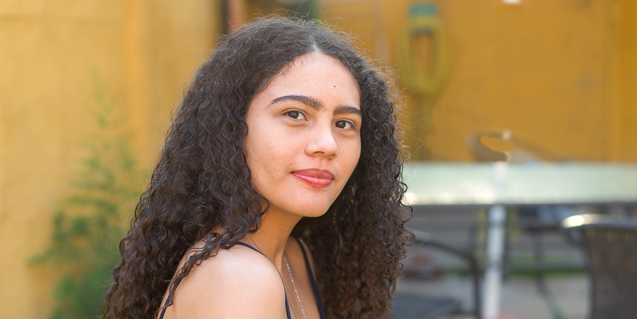 hopeful young hispanic woman